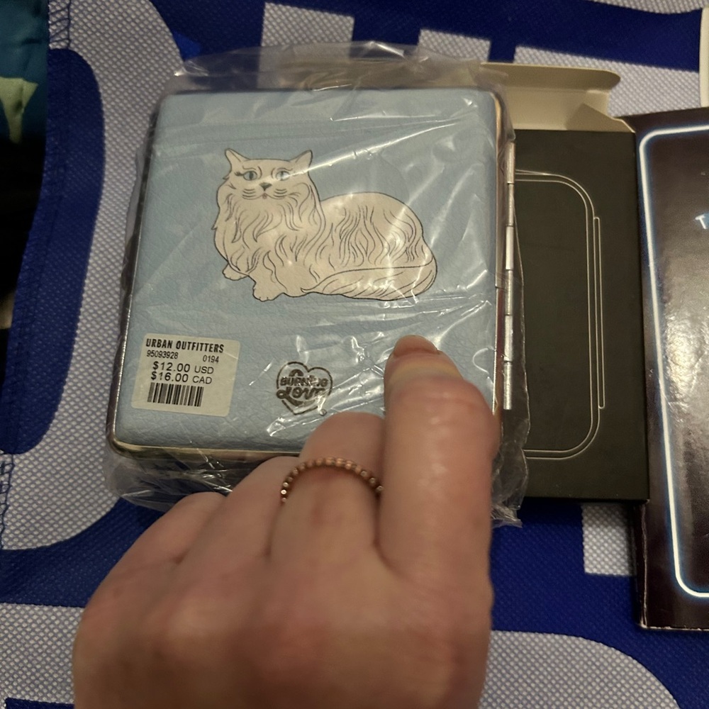 Urban Outfitters classy Tiffany’s inspired cigarette case (12/2024).